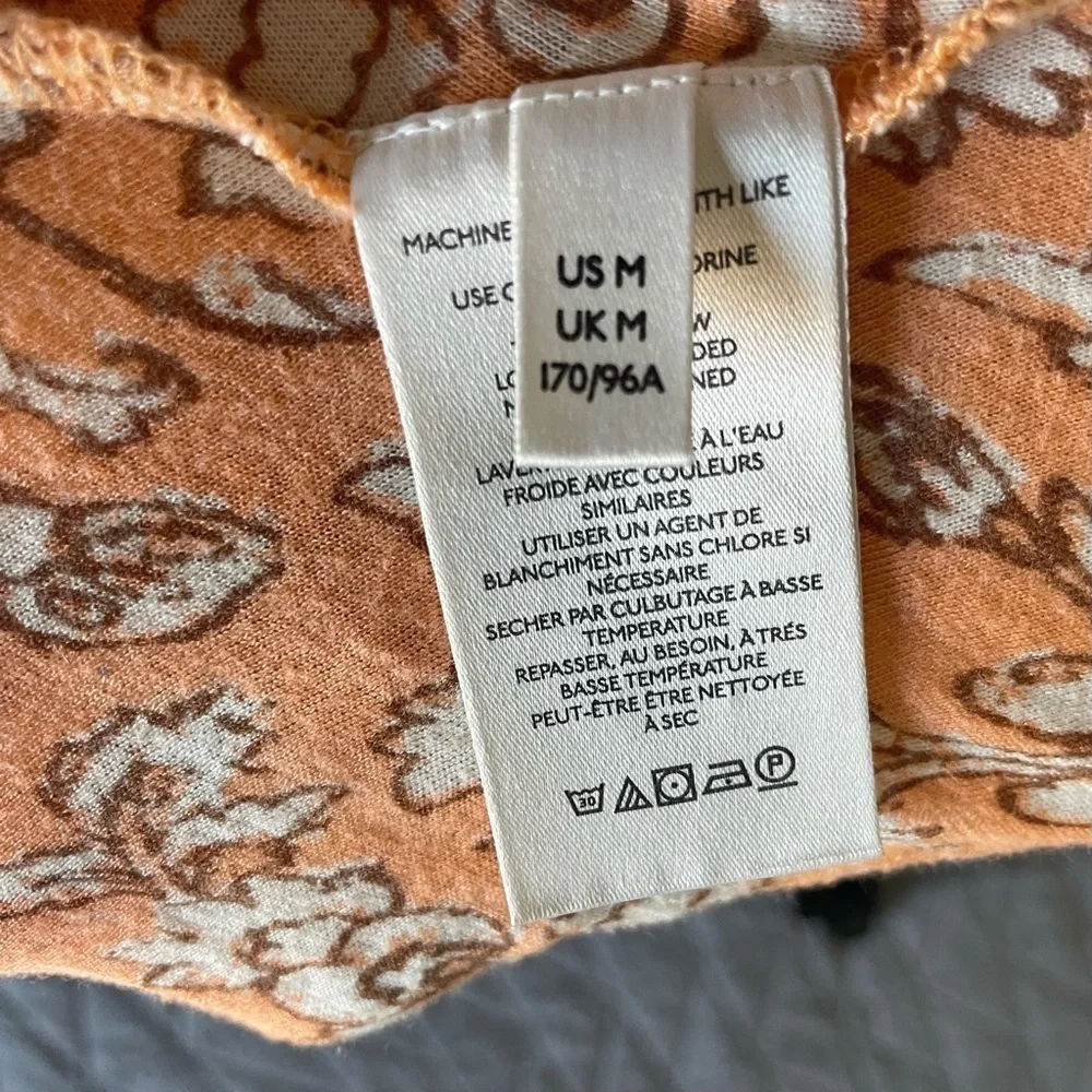 Free People say the word blood orange v-neck top 33018